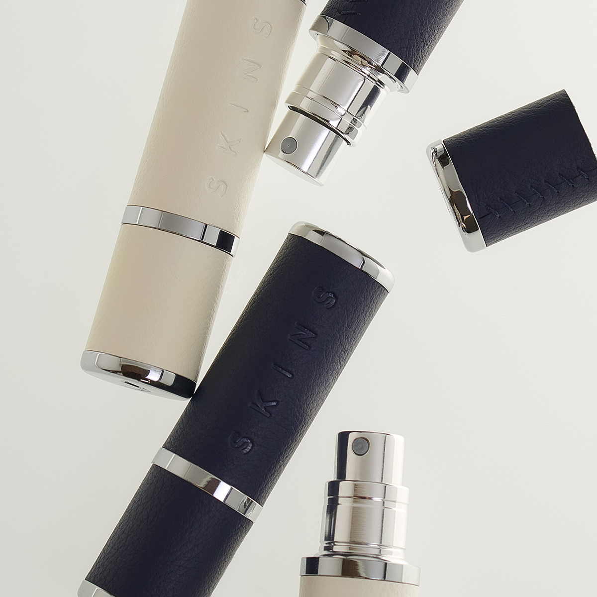 Skins - Travel Spray Blue